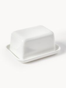 Elegante Porzellan-Butterdose mit Deckel, ideal zum stilvollen Servieren von Butter auf dem Tisch, hochwertiges Design und praktische Handhabung.