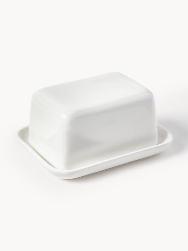 Elegante Porzellan-Butterdose mit Deckel, ideal zum stilvollen Servieren von Butter auf dem Tisch, hochwertiges Design und praktische Handhabung.